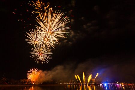 Beautiful Fireworks light up the night sky on Black background