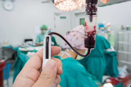 Anesthesiologist change rate iv during the operationの写真素材