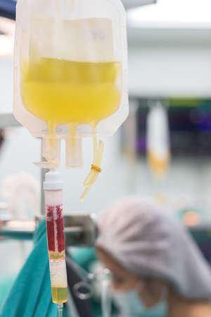 giving blood component during operationの写真素材