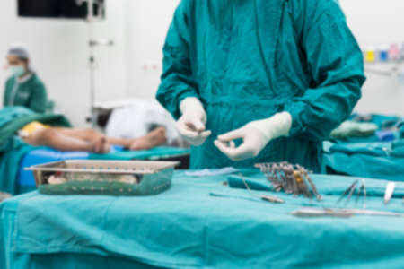 scrub nurse prepare tools for surgeryの写真素材