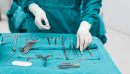 scrub nurse prepare medical equipments for surgeryの写真素材