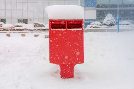 Snow on post boxの写真素材