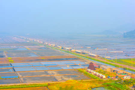 Salt farm and misty at Jeung-do island in South Korea.の写真素材