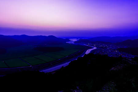 Beautiful sunset and reflection of river bendの写真素材