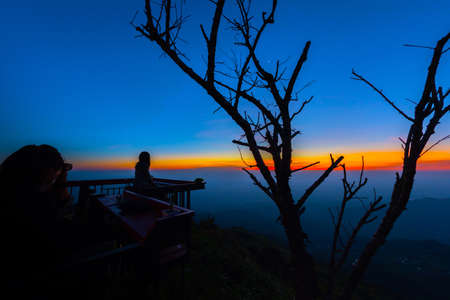 Visitors to the sunrise at Phu Tubberkâ Phetchabun, Thailandの写真素材