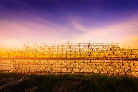 Man preparing the boat for the boat festival season. Illuminated Fire Boat Festival in Nakhon Phanom ,Thailandの写真素材
