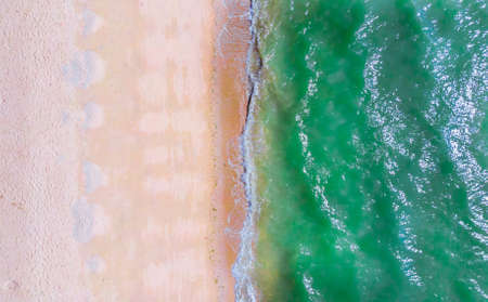 Pattaya Ocean waves mixed with seaweedの写真素材