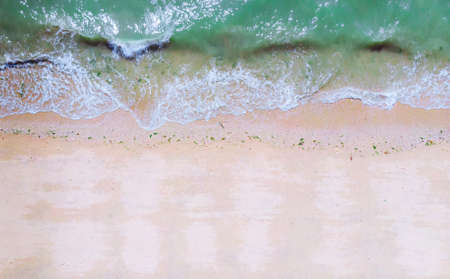 Pattaya Ocean waves mixed with seaweedの写真素材