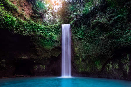 Just one of the many hidden gems this tropical island has to offer,Tibumana waterfall, Bali Indonesiaの写真素材