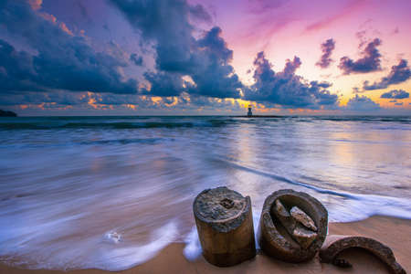 Seascape of Khao Lak with Lighthouse on beach in sunset at Phang Nga province, Thailandの写真素材