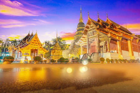 Golden pagoda  at night in wat pra sing,Chiangmai thailandのeditorial素材