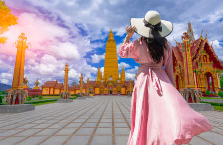 Asian women see the beauty of Wat Mahatagwachiramongkal temple, ( Wat Bangtong ) Krabi,Thailandのeditorial素材