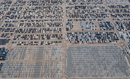 Aerial view of new cars lined up at Industrial Port to exportの写真素材