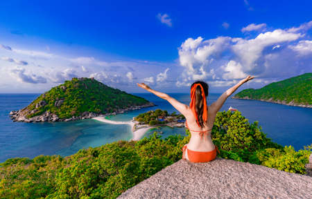 Asian woman visit the hilltop viewpoint at Nang yuan island,Surat thani,Thailandの写真素材