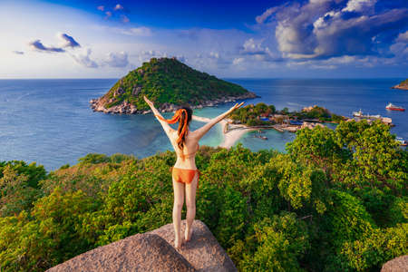 Asian woman visit the hilltop viewpoint at Nang yuan island,Surat thani,Thailandの写真素材