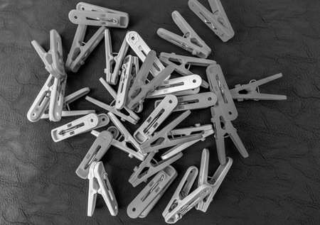 Group of plastic clothespins stacked on the backgroundの写真素材