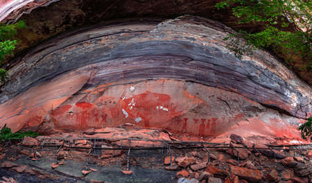 Panorama of Prehistoric paintings on a cliff in the northeast of the country in Ubon Ratchathani ,Thailand. Sandstone texture and ancient painting in Pha Taem National Parkの写真素材