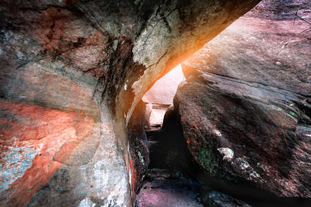Prehistoric paintings on a cliff in the northeast of the country in Ubon Ratchathani ,Thailand. Sandstone texture and ancient painting in Pha Taem National Parkの写真素材