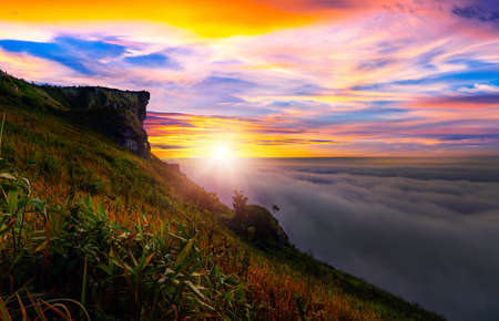 Sunrise and Mist mountain in Phu Chi Fa located in Chiang Rai, Thailand. Phu Chi Fa is the natural border between Thailand and Laosの写真素材