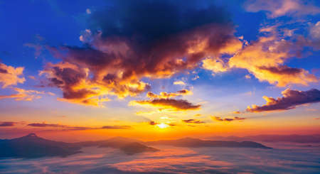 Sunrise and misty at Doi Phatang viewpoint, Chiangrai province, Thailandの写真素材