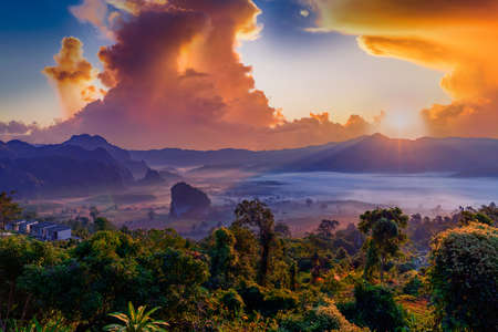 Sunrise and morning mist at Pha Chang Noi Viewpoint, Phu Langka National Park, Phayao Province, Thailandの写真素材