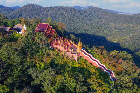 Aerial view of Wat Phra That Doi Phra Chan on the top hill of Doi Phra Chan mountain in Mae Tha, Lampang province, Thailandのeditorial素材