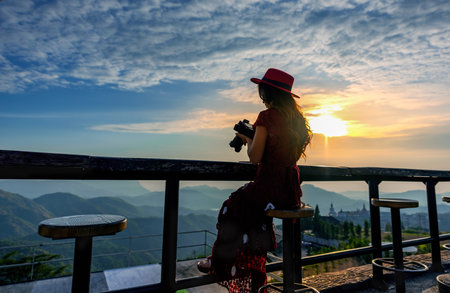 Tourist take a photo at Wat Phra That Pha Son Kaew Temple in Khao Kho Phetchabun province, Thailandの写真素材