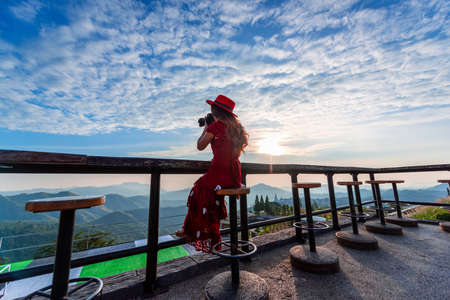 Tourist take a photo at Wat Phra That Pha Son Kaew Temple in Khao Kho Phetchabun province, Thailandの写真素材