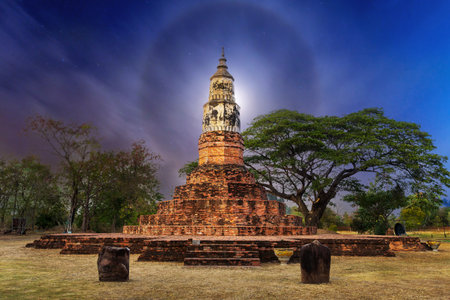 Phra That YaKoo Temple, The old pagoda in Kalasin province, Thailand at nightの写真素材