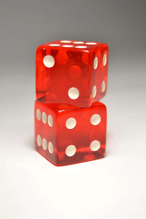 Two Red Dice on top of another