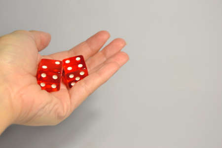 Red dices in the handの写真素材