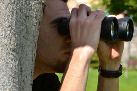 Man looking for a prismaticの写真素材