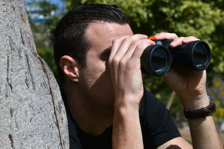 Man looking for a prismaticの写真素材