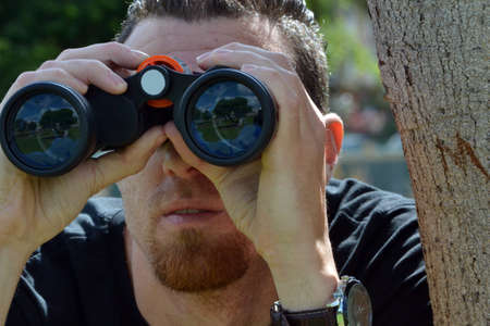 Man looking for a prismaticの写真素材