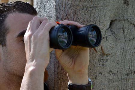 Man looking for a prismaticの写真素材