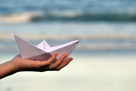 Paper boat on beachの写真素材