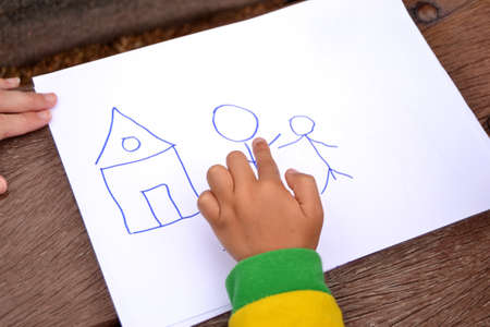 child drawing a ladybugの写真素材