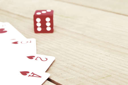 Poker cards and red dice
