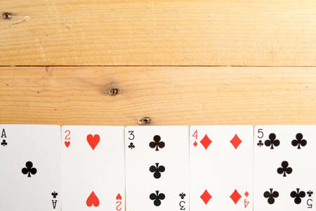 Poker cards on woodの写真素材