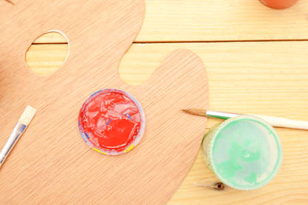 Painter s palette with colorful paintsの写真素材