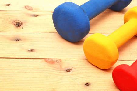 Dumbbells on the woodの写真素材