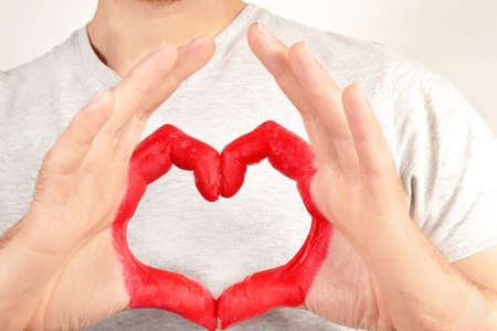 Man with heart shaped handsの写真素材