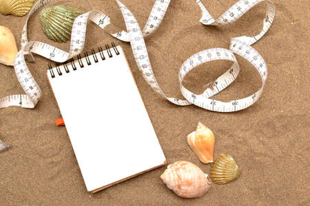 tape measure and notebookの写真素材