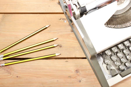Typewriter and pencilsの写真素材