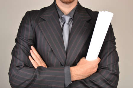 Architect with blueprints in handの写真素材