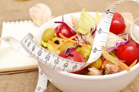 Salad and tape measureの写真素材