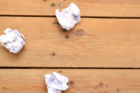paper balls on woodの写真素材