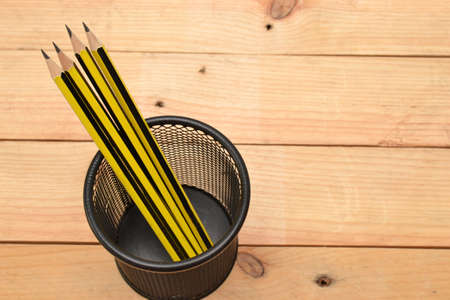 Pencils on woodの写真素材