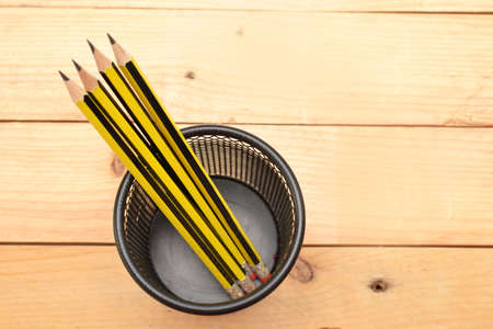 Pencils on woodの写真素材