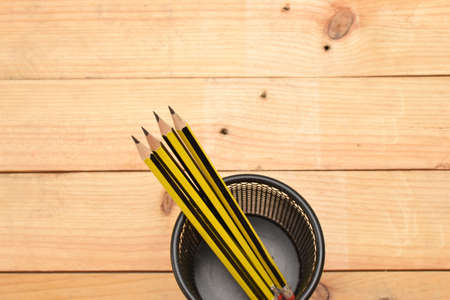 Pencils on woodの写真素材